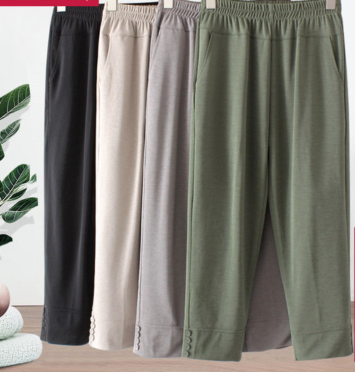 Naiste laia säärega püksid kõrge vöökoha ja nööpidega säärtes