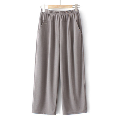 Ženske elastične hlače s džepom