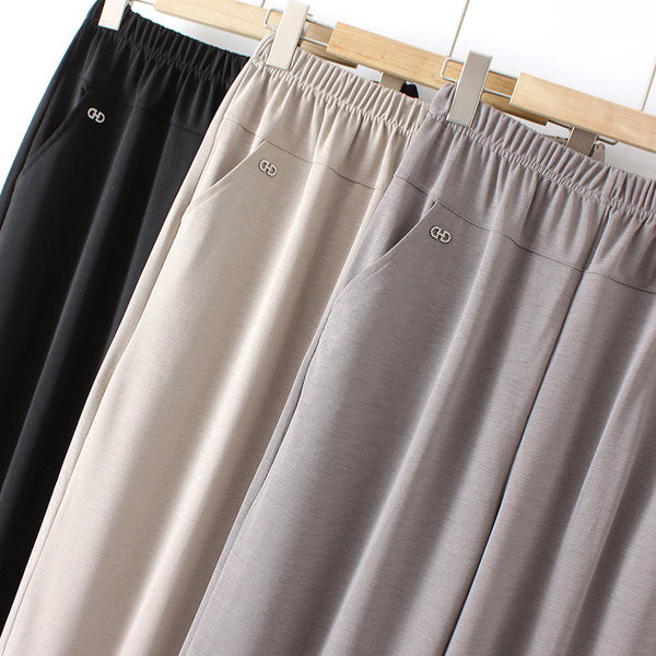 Ženske elastične hlače s džepom