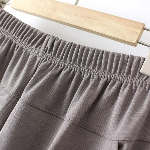 Ženske elastične hlače s džepom