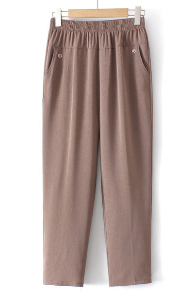 Pantaloni eleganti cu talie elastica, buzunare si element metalic