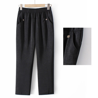 Pantaloni eleganti cu talie elastica, buzunare si element metalic