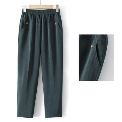 Pantaloni eleganti cu talie elastica, buzunare si element metalic