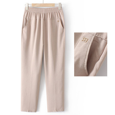 Pantaloni eleganti cu talie elastica, buzunare si element metalic