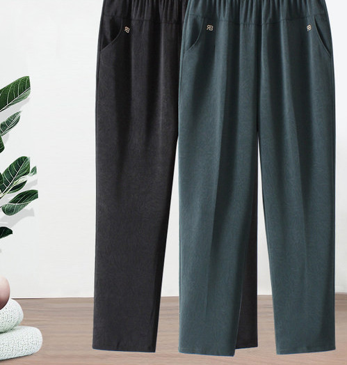 Pantaloni eleganti cu talie elastica, buzunare si element metalic