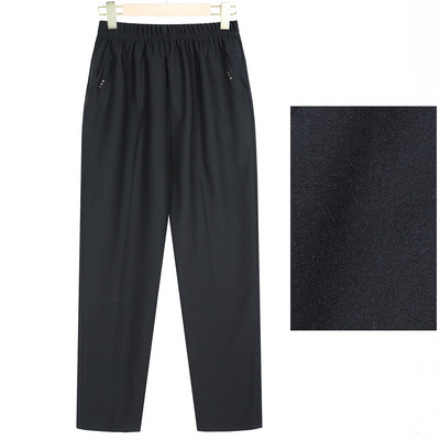 Široki model ženskih hlača s džepovima i elastičnim pojasom