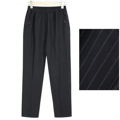 Široki model ženskih hlača s džepovima i elastičnim pojasom