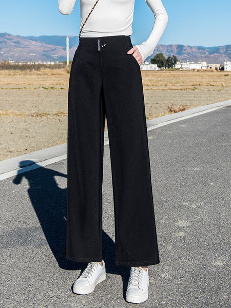 Pantaloni largi de dama cu buzunar