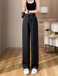 Naiste vabaaja püksid elastsete ja paeltega