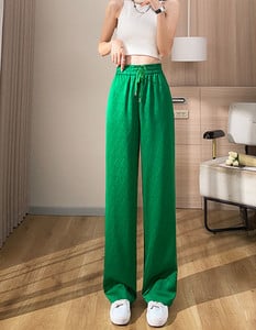 Naiste vabaaja püksid elastsete ja paeltega