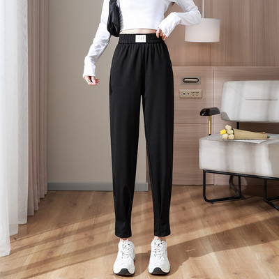 Naiste vabaaja püksid logoga - musta värvi