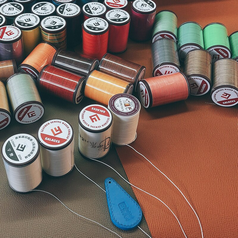 Läbimõõt 0,65 mm 60 meetrit Käsitsi kvaliteetne ümmargune õmblusniit nahast käsitöökäevõru koe polüester Tugevusega niit