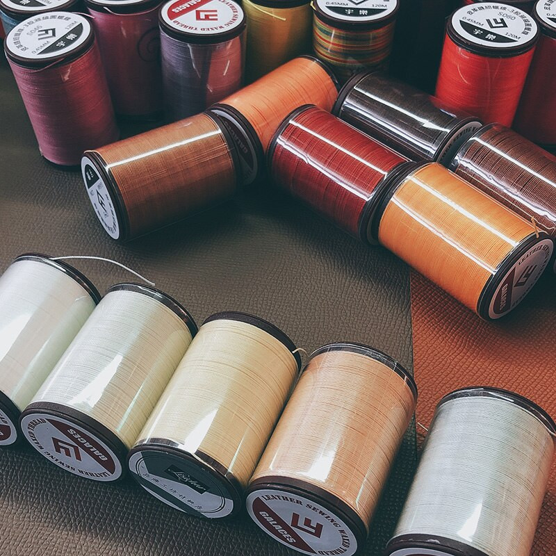 Läbimõõt 0,65 mm 60 meetrit Käsitsi kvaliteetne ümmargune õmblusniit nahast käsitöökäevõru koe polüester Tugevusega niit
