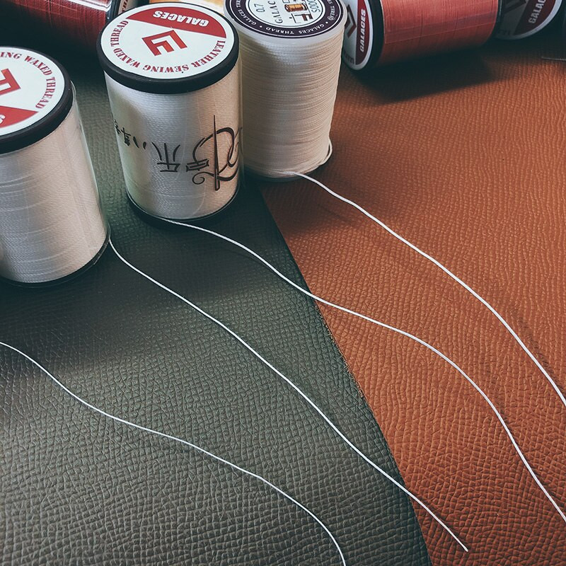 Läbimõõt 0,65 mm 60 meetrit Käsitsi kvaliteetne ümmargune õmblusniit nahast käsitöökäevõru koe polüester Tugevusega niit