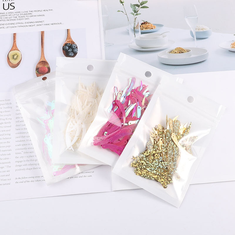 100 tk / partii suurus 5 * 32 mm tšilli elevandiluu kujuga litrid PVC palettid Õmbluskäsitöö DIY kostüüm Lava Rõivas Lentejuela aksessuaarid