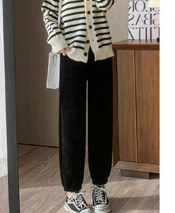 Naiste vabaaja triibulised rasedapüksid mustas ja beežis