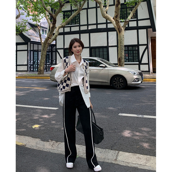 Ženske hlače visokog struka s pasovima