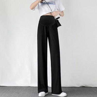 Dviejų spalvų plačios kelnės nėščiosioms