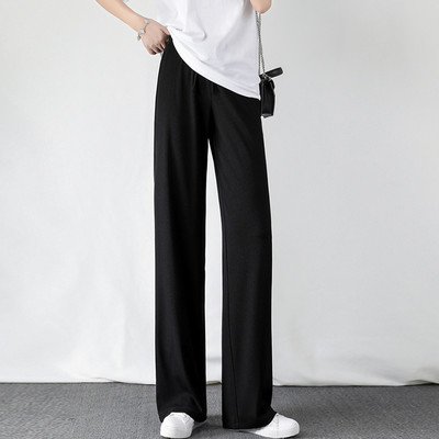 Dviejų spalvų plačios kelnės nėščiosioms