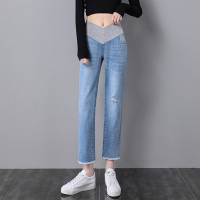 Μοντέρνο σκισμένο τζιν εγκυμοσύνης