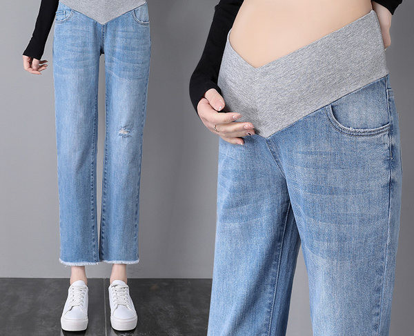 Μοντέρνο σκισμένο τζιν εγκυμοσύνης