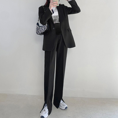 Laisvalaikio moteriškos kelnės su skeltuku