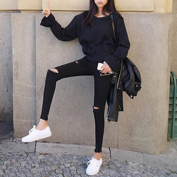 Kõrge vöökohaga rebitud motiividega rasedaks sobivad teksad