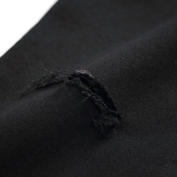 Kõrge vöökohaga rebitud motiividega rasedaks sobivad teksad