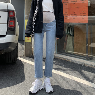 Įprasti džinsai aukštu liemeniu nėščiosioms