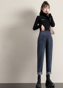 Naiste kõrge vöökohaga kitsad teksad rasedatele