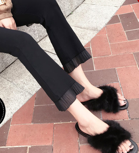 Pantaloni negri de maternitate la modă pentru femei