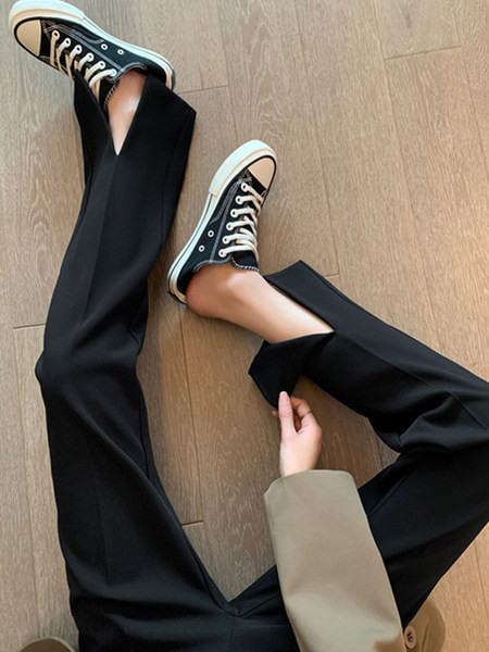 Alkalmi női legging fekete színű hasítékkal