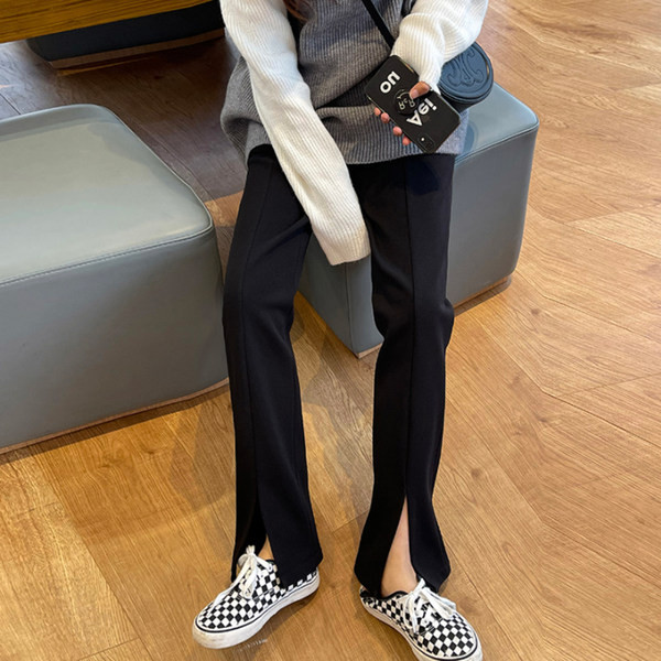 Alkalmi női legging fekete színű hasítékkal