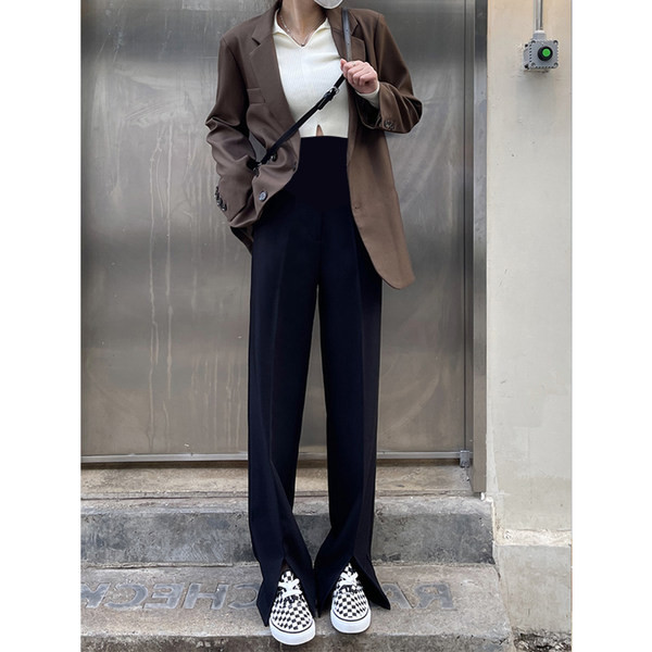 Alkalmi női legging fekete színű hasítékkal