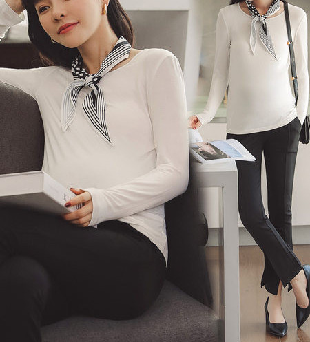 Puhas rasedate pluusi mudel pikkade varrukatega ja ovaalse kaelusega