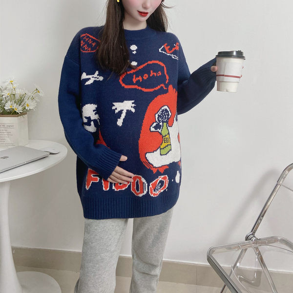 Moderný dámsky sveter s okrúhlym výstrihom v modrej farbe