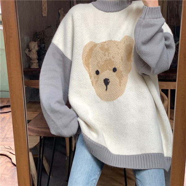 Moteriškas margintas megztinis aukšta apykakle