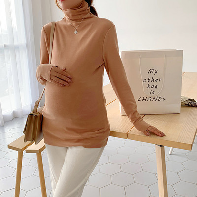 Elastická tehotenská blúzka s dlhými rukávmi a golierom