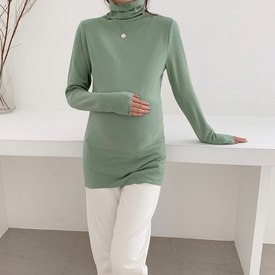 Elastická tehotenská blúzka s dlhými rukávmi a golierom