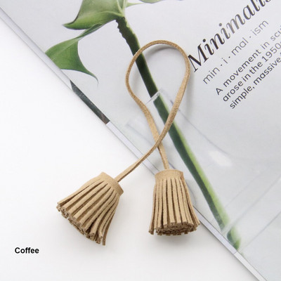 12 tk/partii 3 cm tõmberõngas, kahepealine kunstnahast tutid, narmad, nahast tutid.