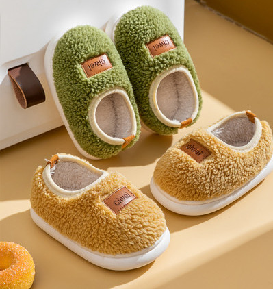 Plush slippers with leather detail