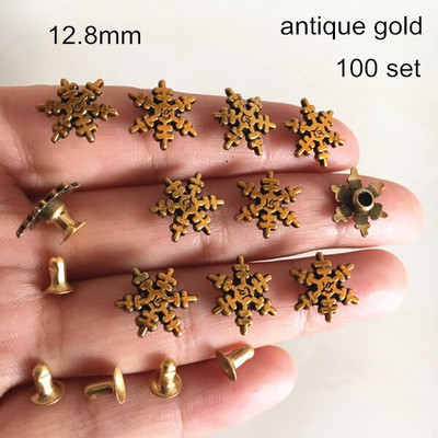 Set de 100 - Nit cu fulg de zăpadă auriu/argintiu/negru, 12,8 mm.