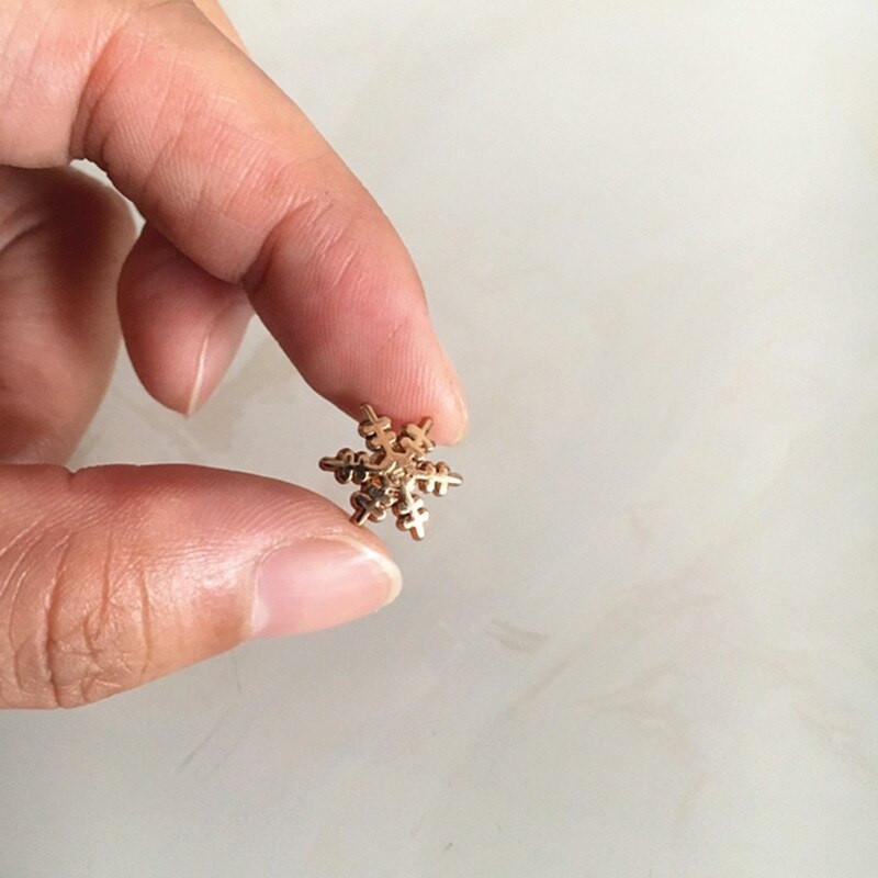 Set de 100 - Nit cu fulg de zăpadă auriu/argintiu/negru, 12,8 mm.