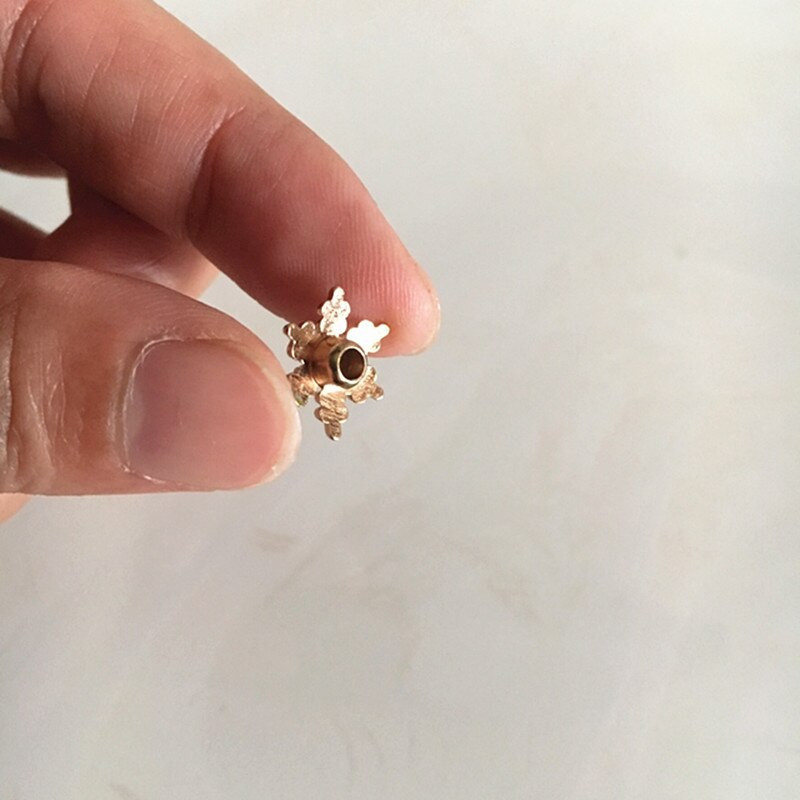 Set de 100 - Nit cu fulg de zăpadă auriu/argintiu/negru, 12,8 mm.