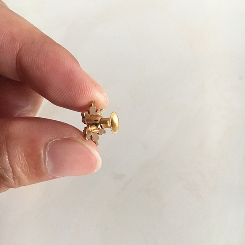 Set de 100 - Nit cu fulg de zăpadă auriu/argintiu/negru, 12,8 mm.