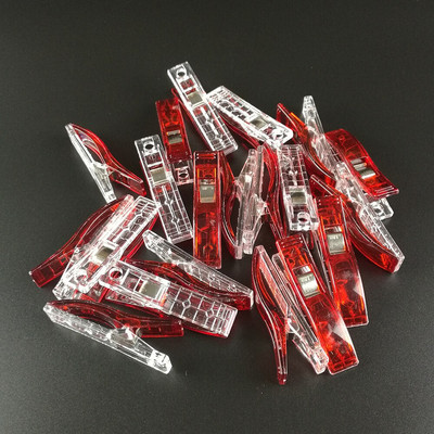 100 vnt. plastikinių audinių segtukai, spaustukai, skirti amatų siuvimui.