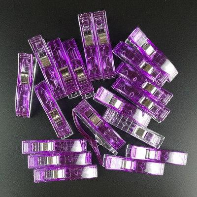 100 vnt. plastikinių audinių segtukai, spaustukai, skirti amatų siuvimui.