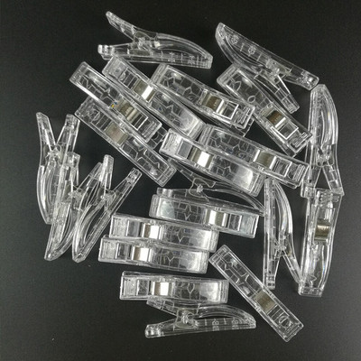 100 vnt. plastikinių audinių segtukai, spaustukai, skirti amatų siuvimui.