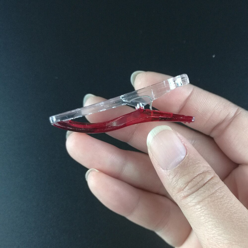 100 vnt. plastikinių audinių segtukai, spaustukai, skirti amatų siuvimui.