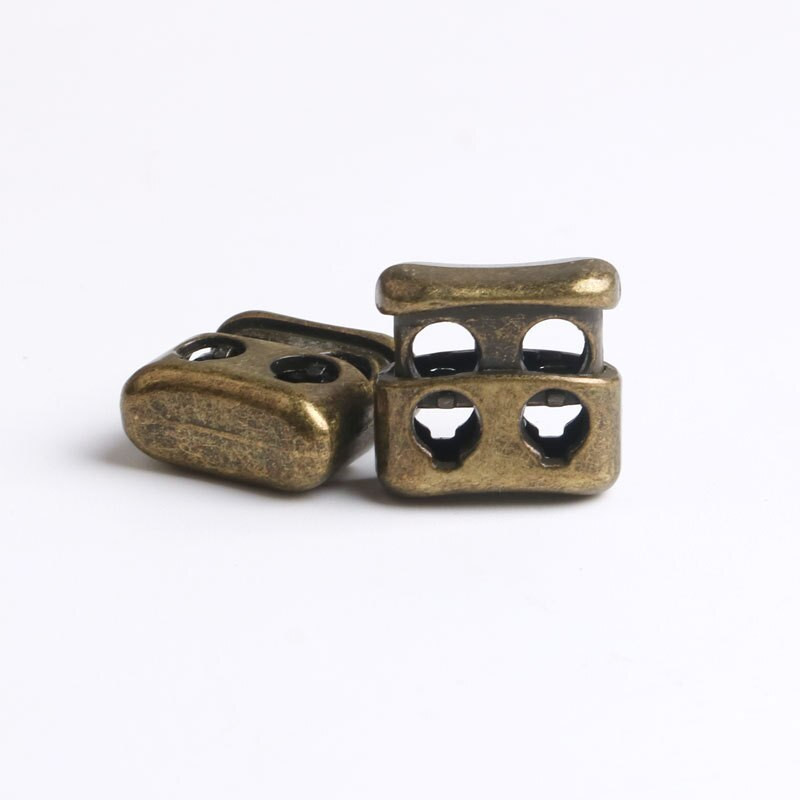 Zliatinový kváder s 2 otvormi, zarážka na šnúrku, konce lana, veko, sťahovacia šnúrka, prepínacia spona na oblečenie, doplnky na šnúrky do topánok